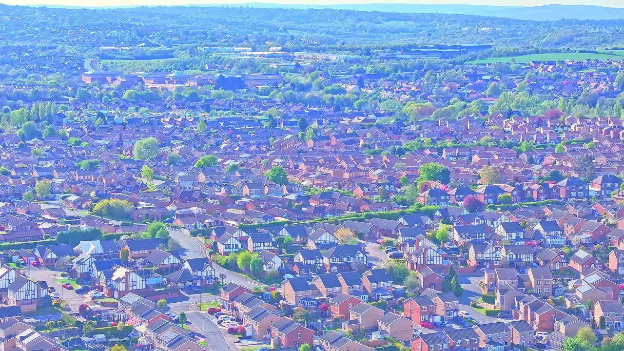 Aerial: residential area during the day in Rother Valley Country Park in the Metropolitan Borough of Rotherham, South Yorkshire, England, crane down drone shot