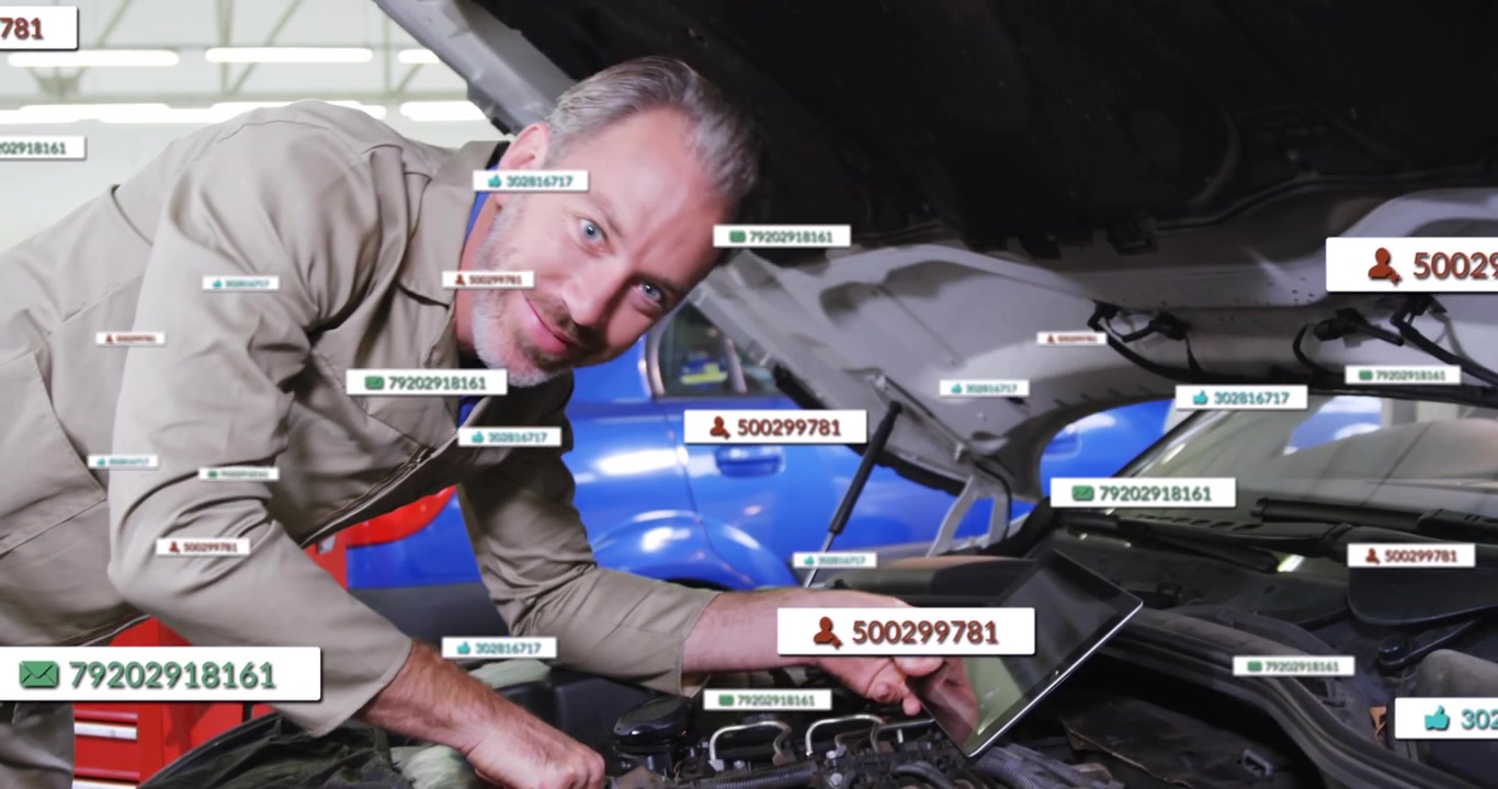 Automotive technician entering bay, opening hood, connecting laptop leads and scanning engine data