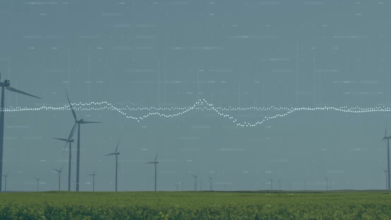 그래프와 변화하는 숫자의 애니메이션은 은 하늘을 배경으로 잔디에 회전하는 풍차 위에 있습니다.