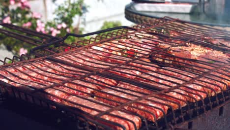 4k food composition of barbecue sausages grilling