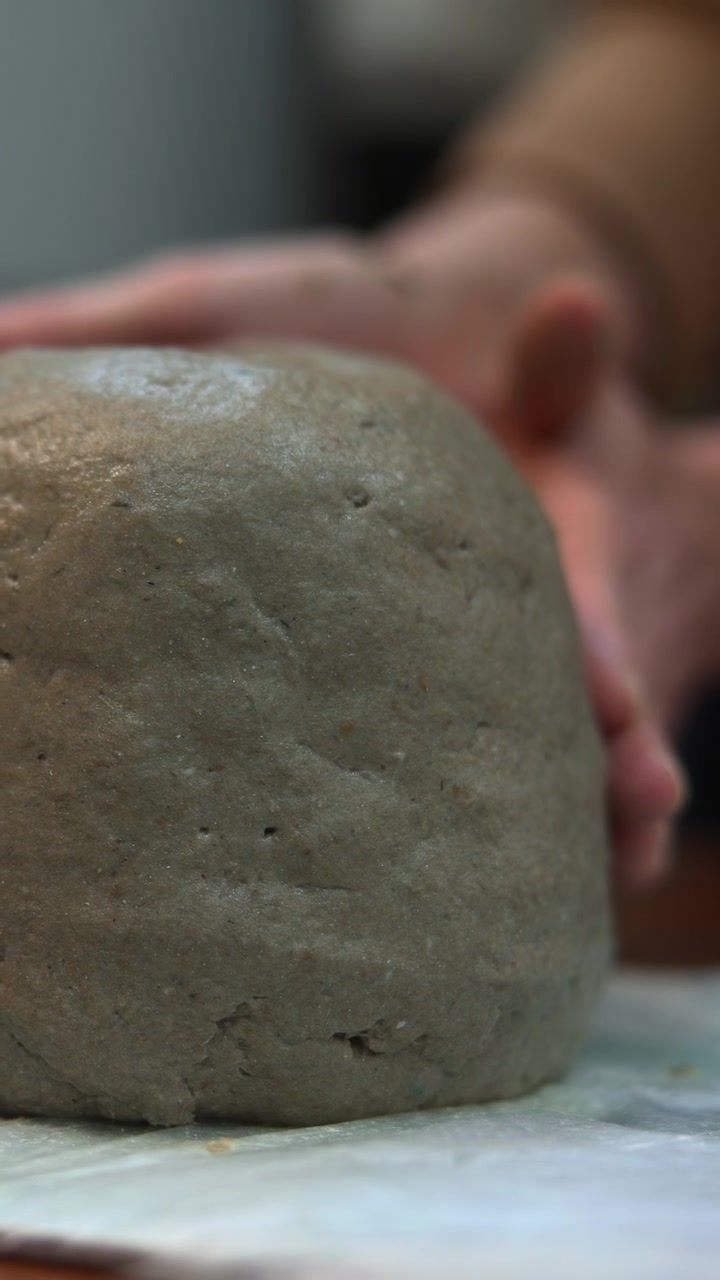 Revealing Finished Mud Lantern On Towelcovered Table, Studio Maker Places Final Piece Beside Bowl And Egg