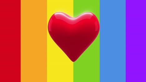 animation of red heart beating over rainbow flag