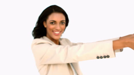 businesswoman showing piggy bank to the camera