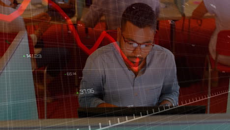 male trader analyzing data on computer in office, with animated red financial line graph overlay
