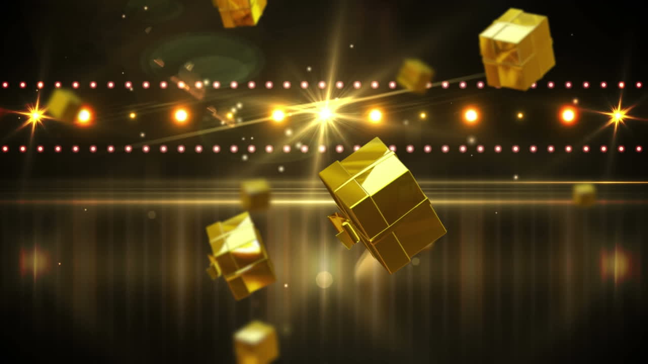 animación de regalos de oro de navidad cayendo sobre los reflectores en el fondo