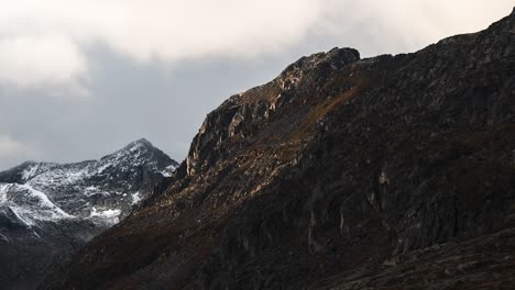 Clouds-and-sunlight-passing-mountain-ridge,-Zermatt,-Switzerland,-Europe