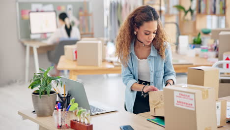 Woman,-boxes-and-laptop-for-logistics