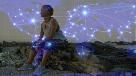 animation of world map and connections over biracial woman in sport clothes resting at sea