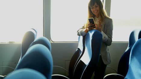 woman using mobile phone while travelling in ferry 4k