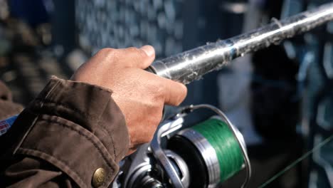 man fishing with a rod and reel