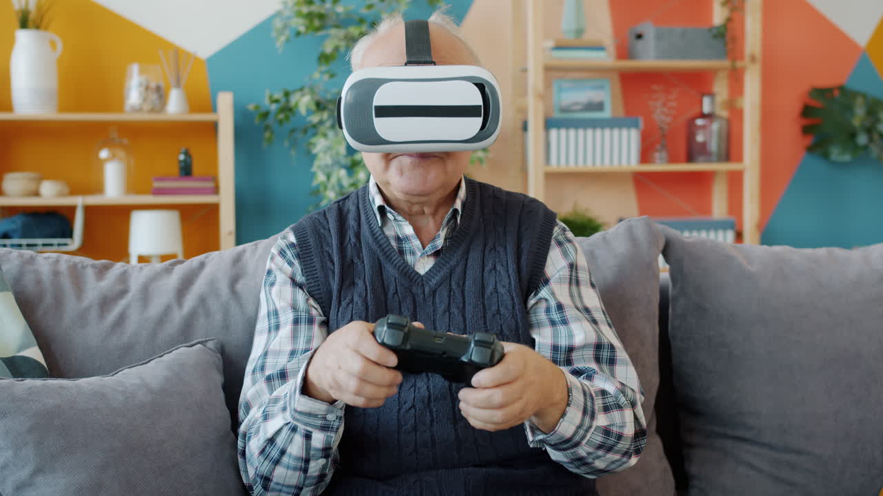 Senior Man Playing VR Games at Home