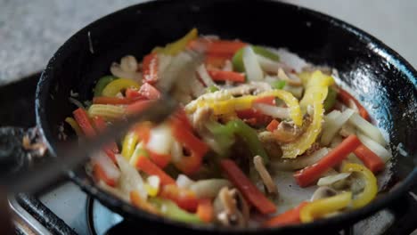 stir-frying colorful vegetables