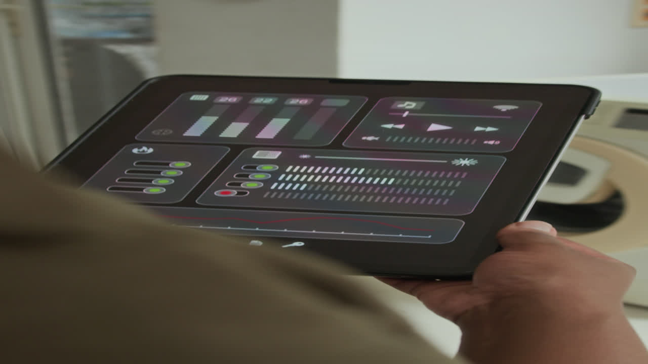 Housewife Using Tablet to Check Smart Home System