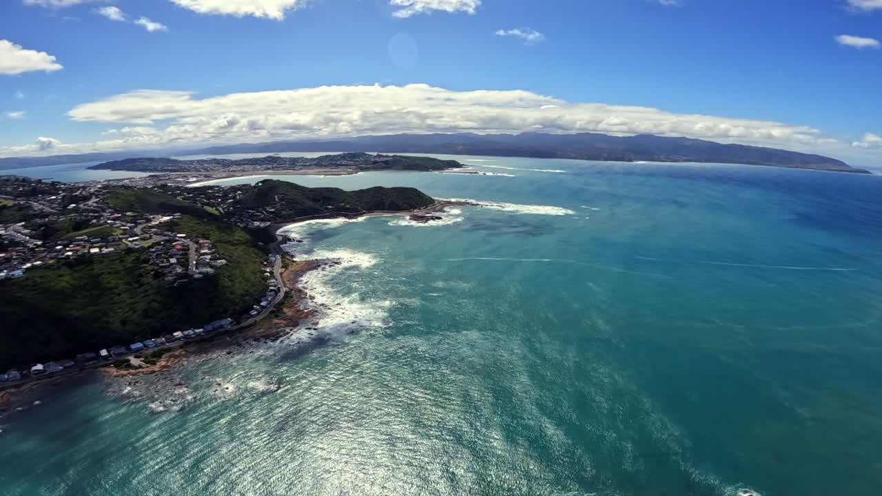 POV aerial shot from helicopter approaching Wellington airport, New Zealand