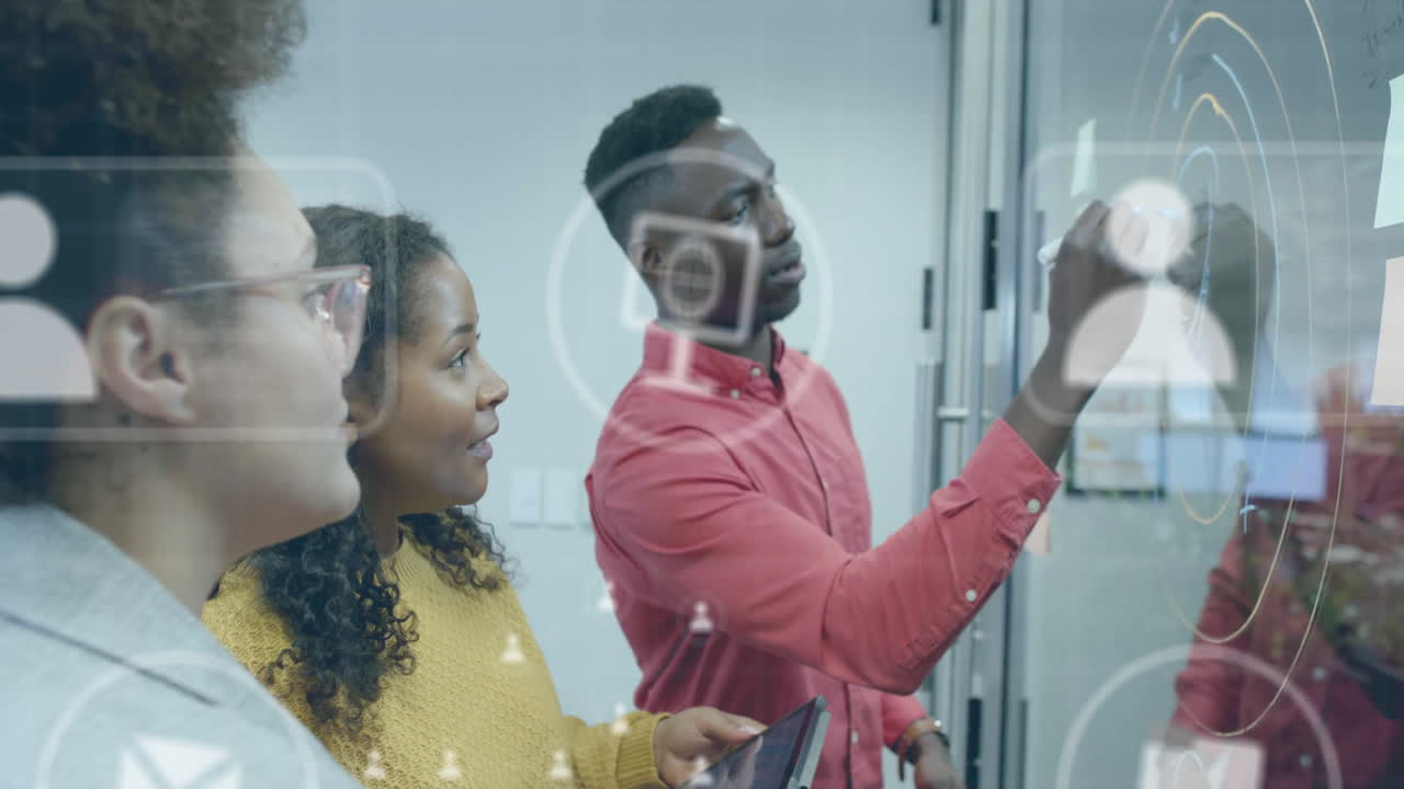 Animation of icons and data processing over diverse business people in office