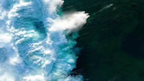 breaking wave during sunset on the canary islands - lanzarote