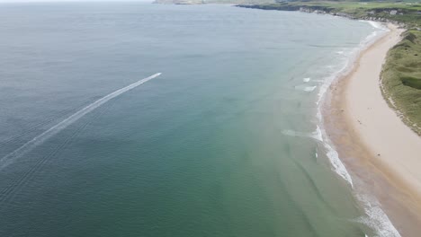adventure speed boat at portrush whiterocks beach aerial