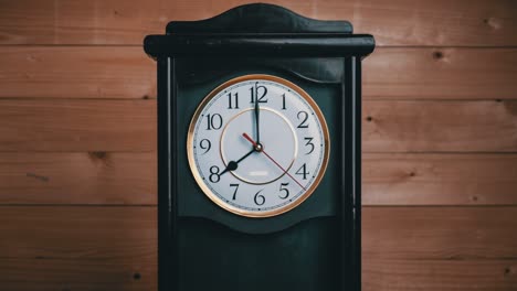 timelapse of vintage clock with full turn of time hands at 8 am or pm