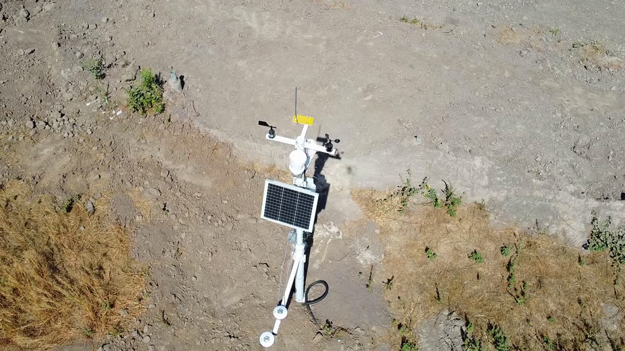 Static drone shot close to a weather station, sunny day in Gambia, Africa