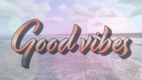 animación de las palabras buenas vibraciones escritas en letras rosadas sobre el cielo azul nublado y el mar