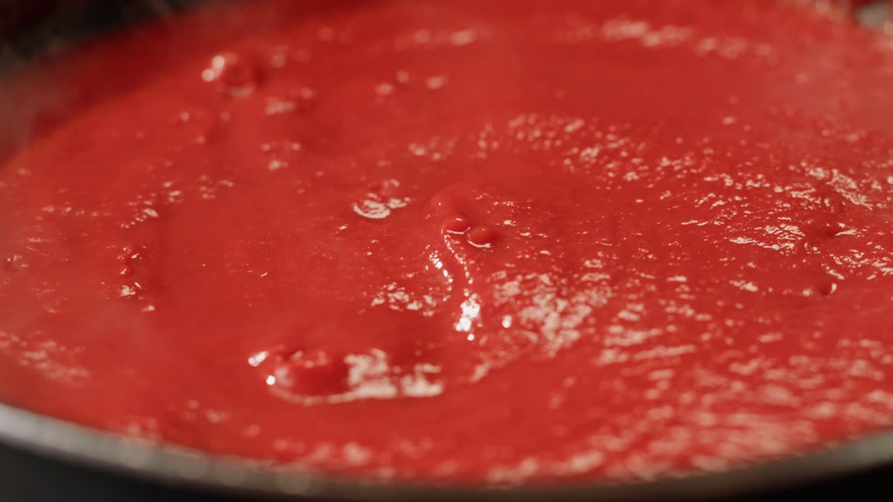 Tomato Sauce Cooking in a Pan