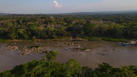 aerial: large river flowing through rainforest in mexico, 4k