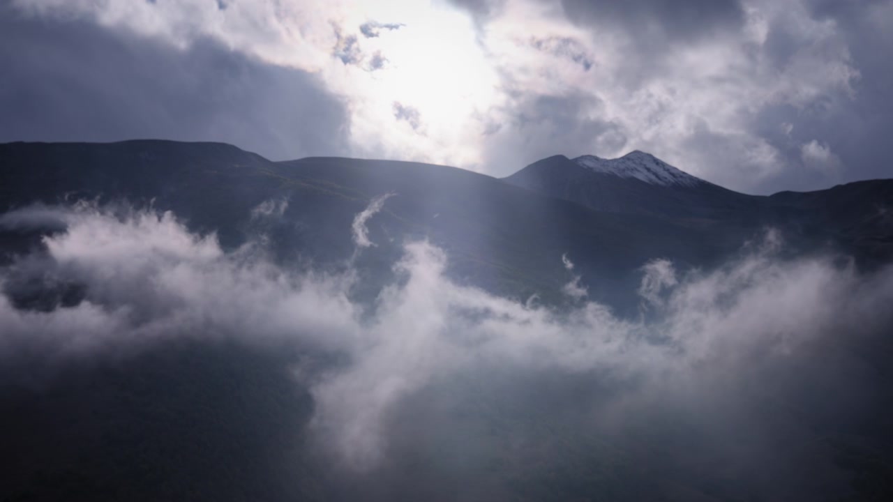 Sun rays shining through clouds