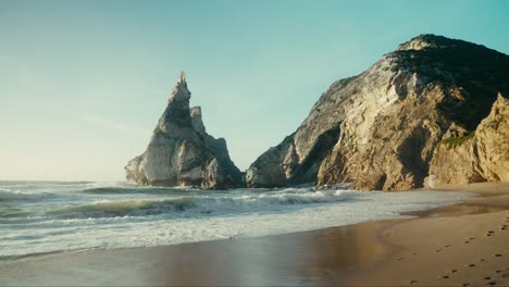 coastal landscape with dramatic rock formations and waves