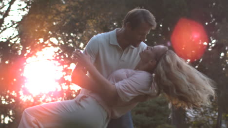 delighted couple dancing together