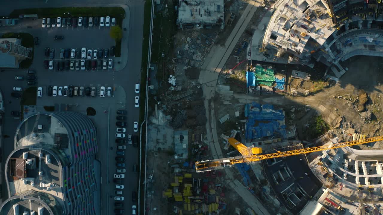 Aerial View of Urban Construction Site and Parking Lot
