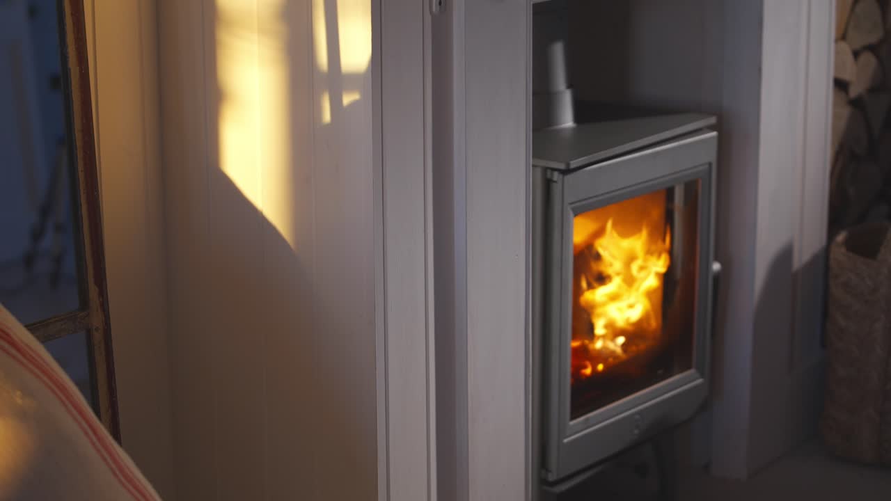 Burning stove in home fireplace