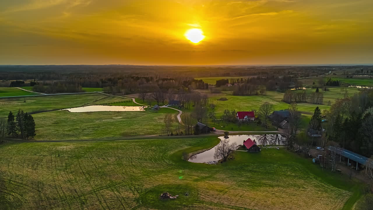 Beautiful Sunset Sky Over Serene Countryside Farm Village. Timelapse