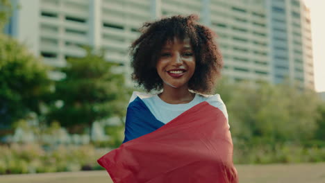 smiling woman with french flag