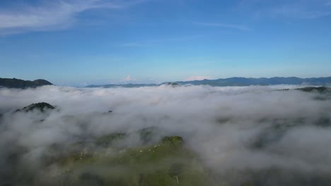 Aerial-Drone-Above-White-Fluffy-Clouds-Against-Blue-Sky-Background,-4K