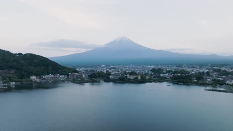 aerial shot of famous kawaguchi lake and distant fuji mountain, japan