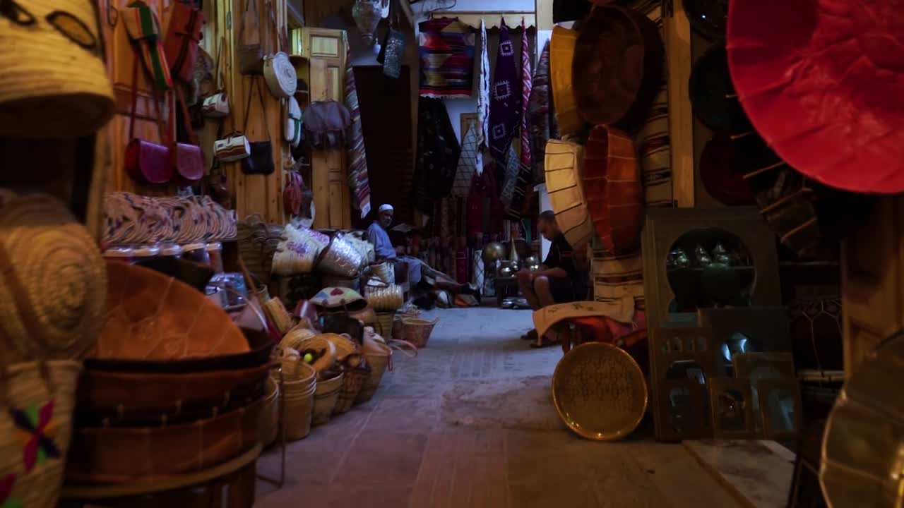 Traditional Moroccan pouf and basket souk in Marrakech, Morocco, april 02.