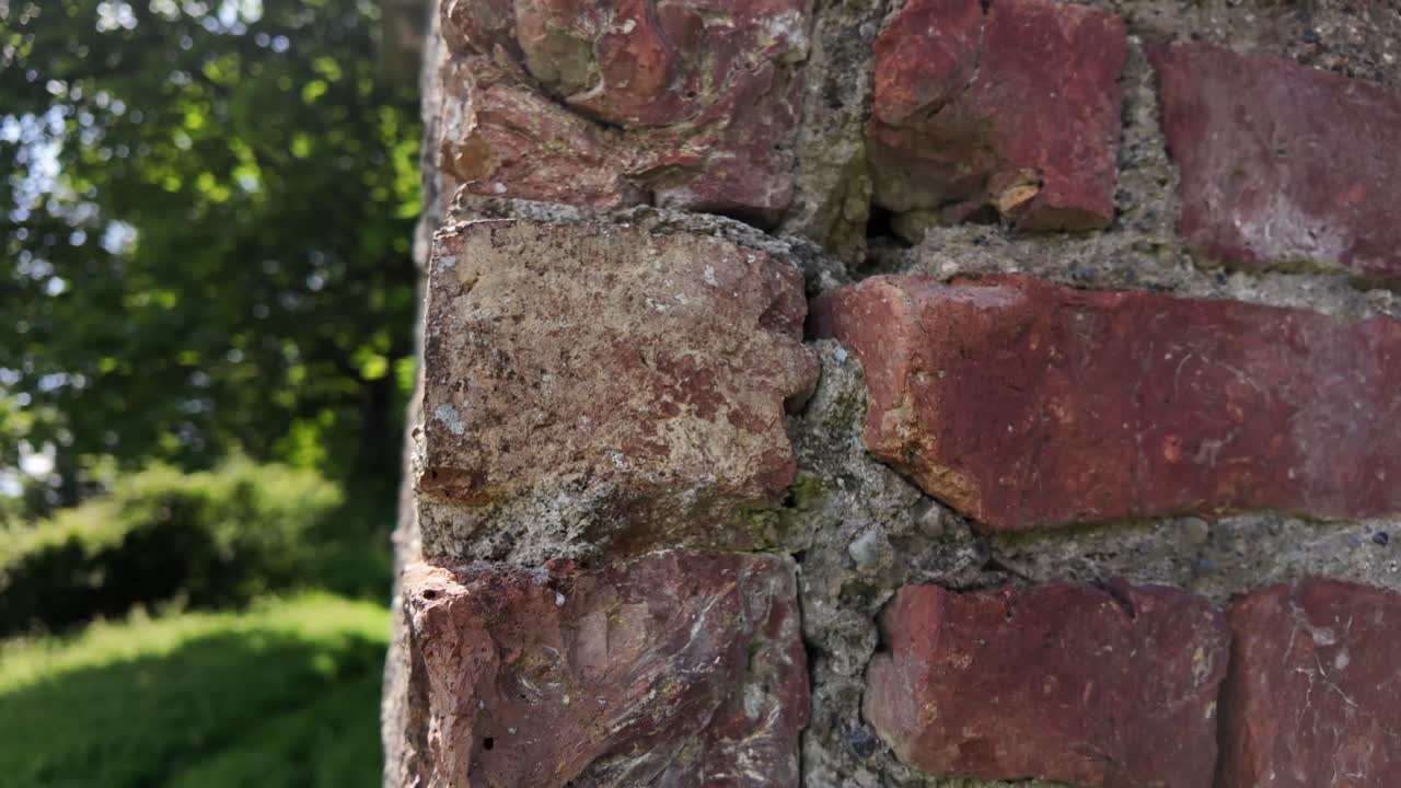Architectural Ruin Textured Red Brick and Stone Wall of an Old Building