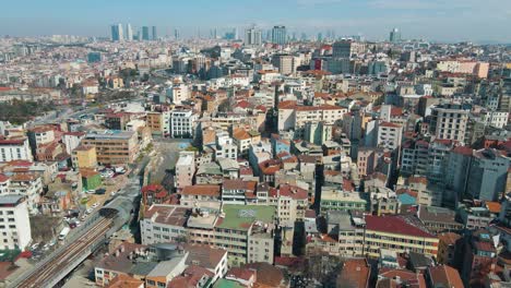 aerial drone forwarding shot over city of istanbul, turkey as residential and office buildings at daytime