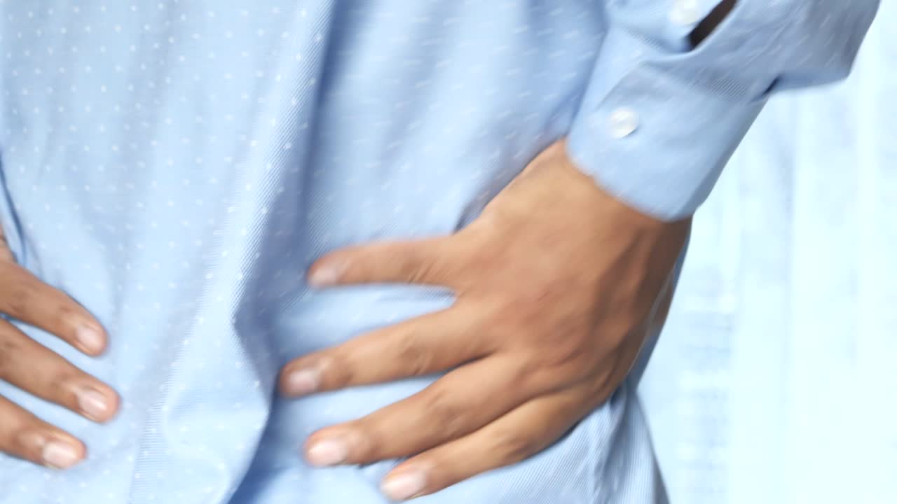 hombre con dolor de espalda