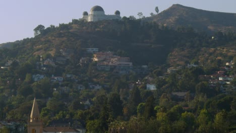 Tilt-up-shot-of-Griffith-Observatory-Los-Feliz-Hillside---Mount-Hollywood