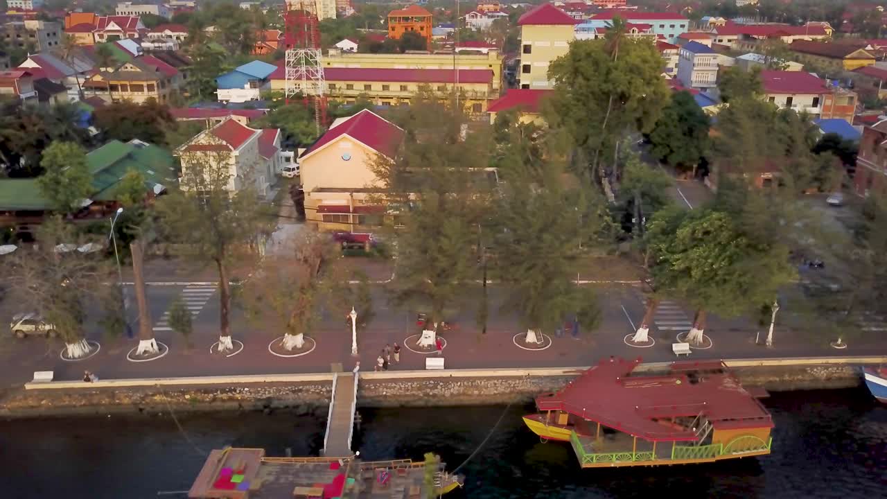 Aerial view of cityscape with buildings and boats