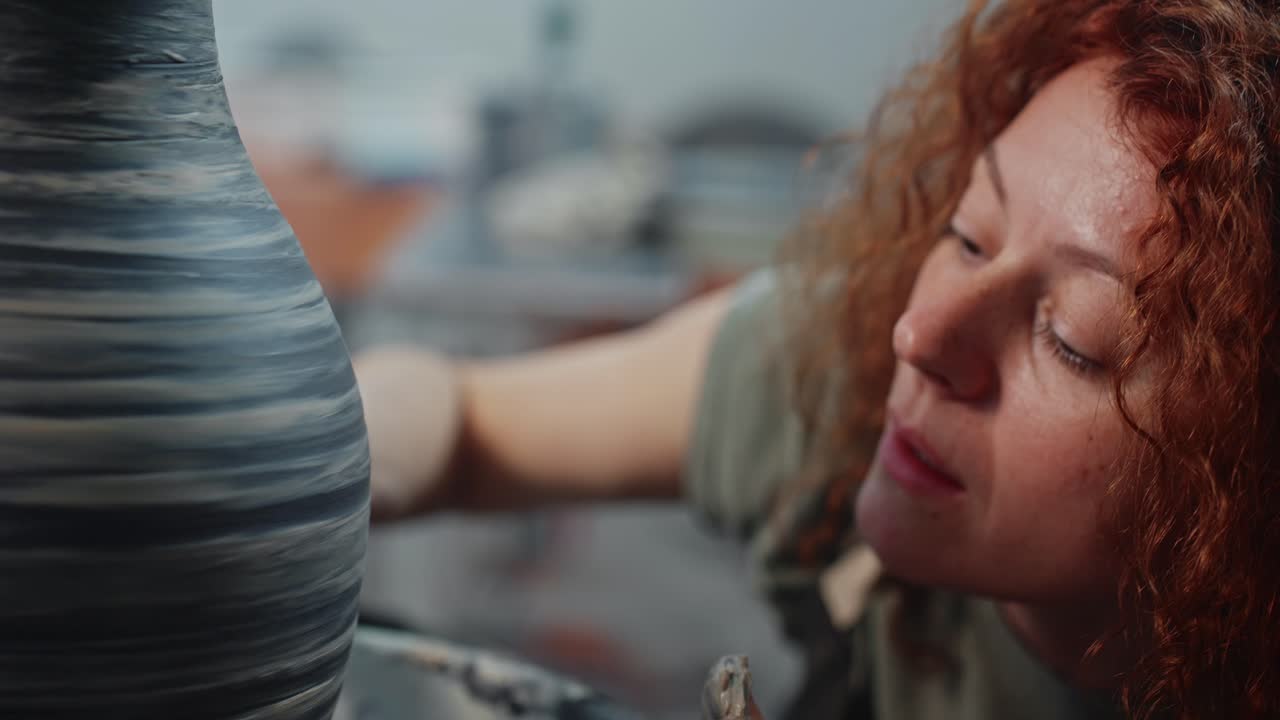 Woman Potter Working on a Vase
