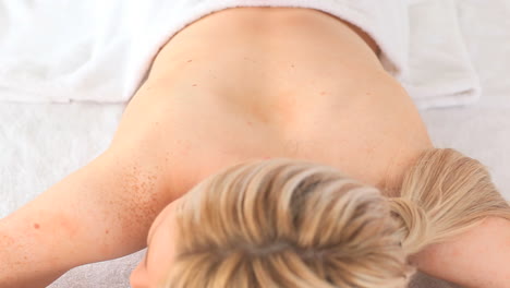 young blondhaired woman having a massage