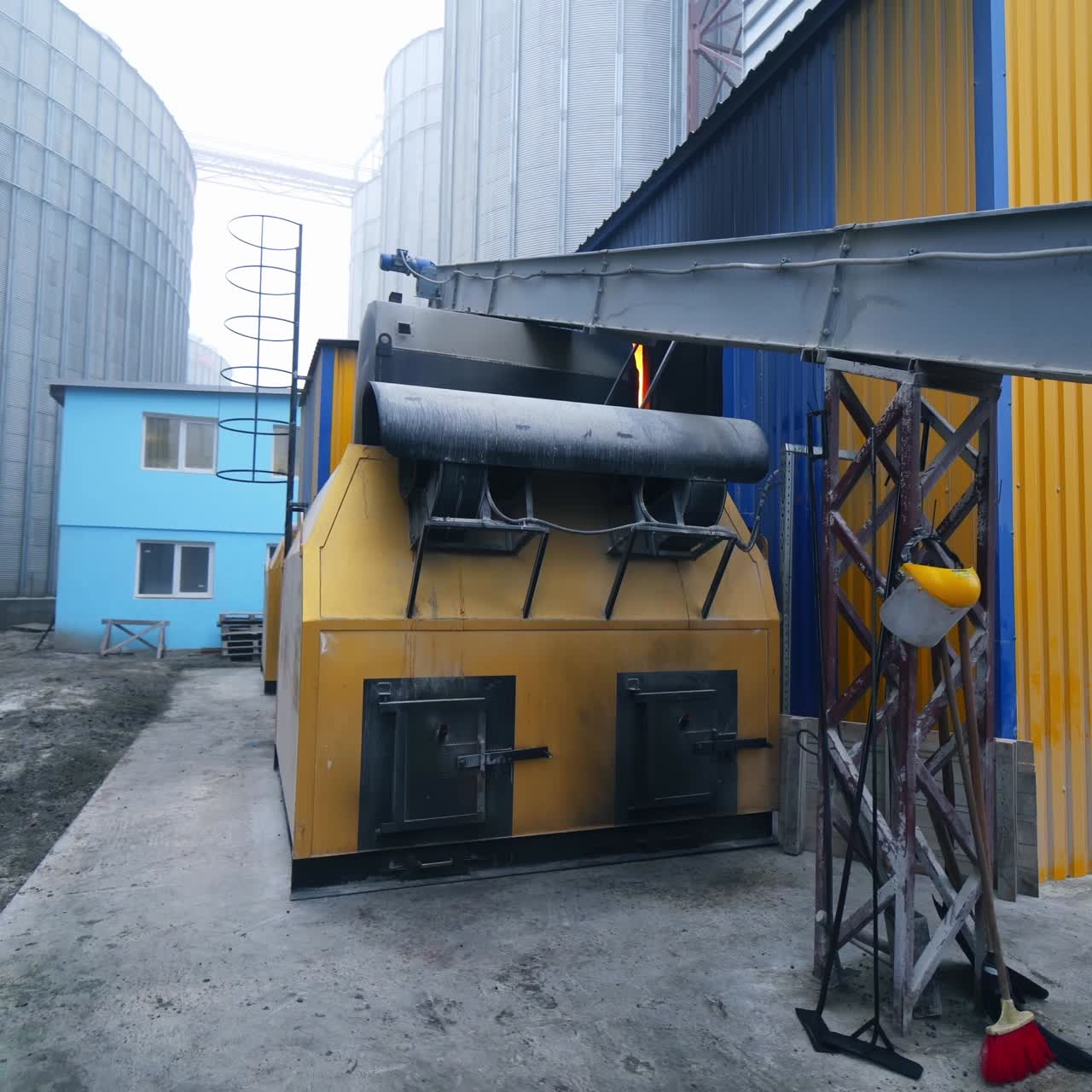 Big factory elevator construction equipment. Industrial agricultural building