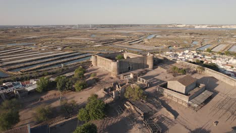 Aerial-dolly-out-showcasing-medieval-Castle-of-Castro-Marim-and-the-remains-within-fortification-in-Algarve-Portugal