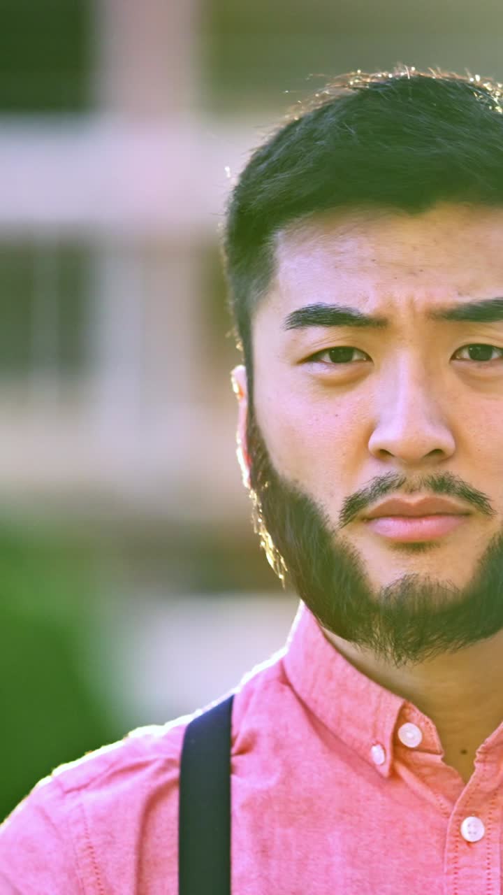 Man with hand raised