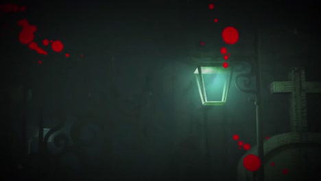 animación de sangre sobre el cementerio y linterna por la noche