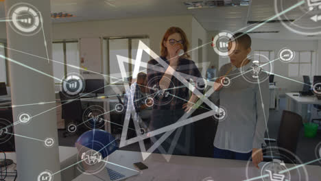 animation of network of connections over diverse businesspeople working in office