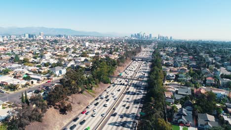 aerial los angeles freeway traffic driving california city drone