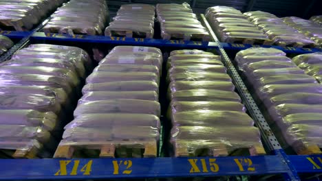 row of packages at a warehouse racks. warehouse interior. 4k.